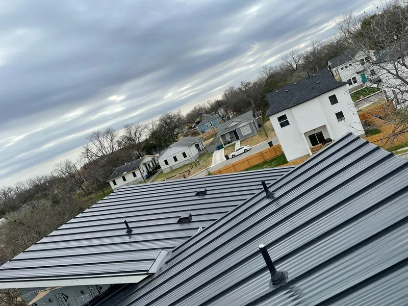 Standing seam metal roof panels with vents for Skylight Repair in Belding